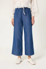 PANTALONS À OURLET BRODÉ