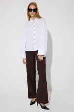 CHEMISE À MANCHONS DORÉS ET BOUTONS DORÉS