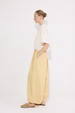 PANTALONS À BONNETS ÉLASTIQUES