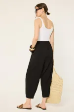 PANTALON CAROTTE AVEC TAILLE ÉLASTIQUE PANTALON CAROTTE AVEC TAILLE ÉLASTIQUE