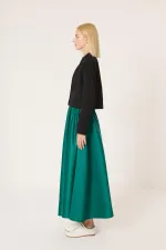 JUPE EN SATIN À VOLANTS