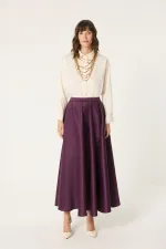 JUPE EN SATIN À VOLANTS