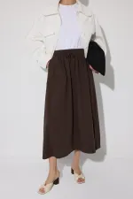 JUPE À TAILLE ÉLASTIQUE AVEC POCHES