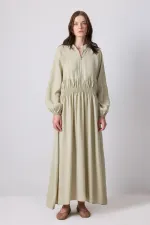 BELİ BÜZGÜLÜ OVERSIZE ELBİSE