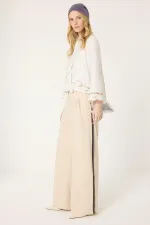 PANTS WITH STONE-EMBELLISHED STRIP DETAIL