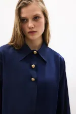 CHEMISE COURTE À BOUTONS DORÉS