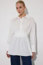 PEPLUM TUNIC WITH CORSET AT THE WAIST