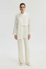 ASYMMETRICAL SHIRT WITH PLEATED DETAILS