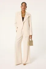 ENSEMBLE VESTE ET PANTALON ASYMÉTRIQUE