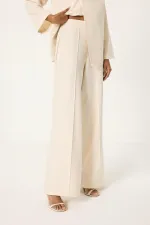 Ensemble tunique et pantalon asymétrique avec détail de ceinture