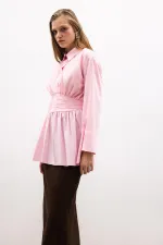 PEPLUM TUNIC WITH CORSET AT THE WAIST