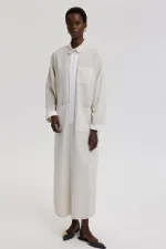 ROBE EN LIN TEXTURÉ AVEC DÉTAILS À RAYURES