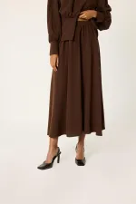 ENSEMBLE TUNIQUE ET JUPE AVEC DÉTAIL DE CEINTURE