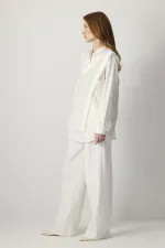 Tunique à col en V et à volants en dentelle