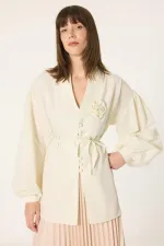 Tunique à manches ballon ornée d'appliqués floraux