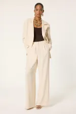 ENSEMBLE VESTE ET PANTALON ASYMÉTRIQUE