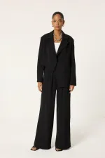 ENSEMBLE VESTE ET PANTALON ASYMÉTRIQUE