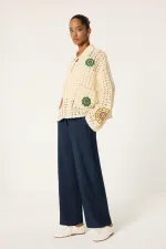 PANTALON LOGAL À JAMBES LARGES