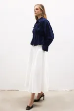 CHEMISE À NŒUD HABILLÉE