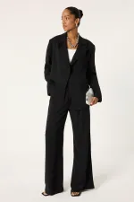 ENSEMBLE VESTE ET PANTALON ASYMÉTRIQUE