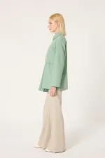 CHEMISE ASYMÉTRIQUE AVEC DÉTAILS PLISSÉS