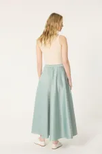 JUPE EN SATIN À VOLANTS