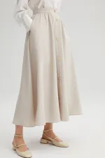 JUPE CUPRA À BOUTONS DORÉS