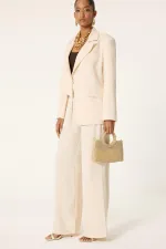 ENSEMBLE VESTE ET PANTALON ASYMÉTRIQUE