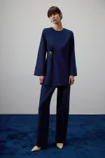 DRAPED BLOUSE WITH METAL ACCESSORIES