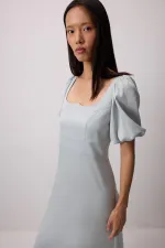 SHORT-SLEEVED DRESS WITH GATHERED SHOULDER