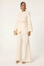 Ensemble tunique et pantalon asymétrique avec détail de ceinture