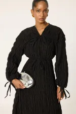 ROBE SPÉCIALE REMBOURRÉE ET FRONCÉE