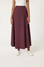 ENSEMBLE VESTE ET JUPE À NŒUDS