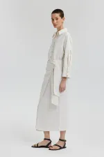 JUPE EN LIN TEXTURÉ AVEC DÉTAIL DE NŒUD