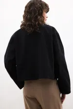 VESTE COURTE À DOUBLE BOUTON