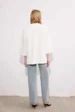 KNITTED TUNIC WITH POCKETS