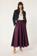 JUPE EN SATIN À VOLANTS