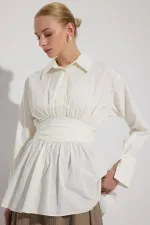 PEPLUM TUNIC WITH CORSET AT THE WAIST