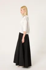 Jupe trapèze avec détails de poches