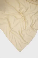 CHÂLE EN MOUSSELINE TRICOTÉE