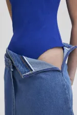 SLEEVELESS RIBBED BODYSUIT