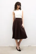 PLEATED BELTED SKIRT