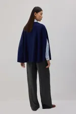 PONCHO EN MAILLE SURDIMENSIONNÉ