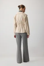 VESTE CROISÉE AVEC TAILLE ÉLASTIQUE