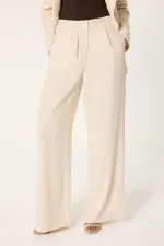 ENSEMBLE VESTE ET PANTALON ASYMÉTRIQUE