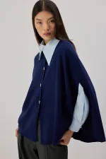 PONCHO EN MAILLE SURDIMENSIONNÉ