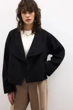 VESTE COURTE À DOUBLE BOUTON