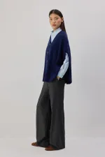 PONCHO EN MAILLE SURDIMENSIONNÉ