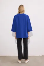 KNITTED TUNIC WITH POCKETS