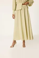 ENSEMBLE TUNIC ET JUPE AVEC DÉTAIL DE CEINTURE